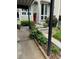 Landscaped front yard, carport and entryway to a condominium at 1932 Variations Ne Dr, Atlanta, GA 30329
