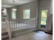 Spacious living room with a partial view of the outdoors from the doorway at 1932 Variations Ne Dr, Atlanta, GA 30329
