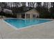 Community pool with blue water and a pool house; nice place to cool off on hot days at 1932 Variations Ne Dr, Atlanta, GA 30329
