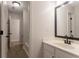 Bathroom featuring a tub and shower, and an adjacent hallway at 2346 Hampton Park Dr, Buford, GA 30519