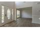Inviting foyer featuring hardwood floors, high ceilings, and decorative front door with sidelights at 2346 Hampton Park Dr, Buford, GA 30519