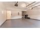 Two-car garage with gray epoxy flooring and plenty of storage space at 2346 Hampton Park Dr, Buford, GA 30519