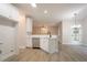 Bright kitchen with white cabinets, stainless steel appliances, and modern sink at 2346 Hampton Park Dr, Buford, GA 30519