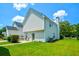 A spacious backyard featuring a well-maintained lawn and a small patio set at 3332 Chastain Landings Ct, Marietta, GA 30066