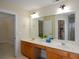 Bathroom vanity featuring double sinks, large mirror, and ample counter space at 3332 Chastain Landings Ct, Marietta, GA 30066