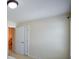 Neutral bedroom with a double door closet and beige carpet at 3332 Chastain Landings Ct, Marietta, GA 30066