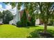 Well-maintained home with lush lawn and mature trees in a quiet neighborhood at 3332 Chastain Landings Ct, Marietta, GA 30066