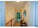 Upstairs hallway bathed in natural light and adorned with stylish decor at 3332 Chastain Landings Ct, Marietta, GA 30066