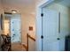 Bright upstairs hallway with doors to rooms and stylish decor at 3332 Chastain Landings Ct, Marietta, GA 30066