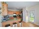 Charming kitchen with stainless steel appliances, hardwood floors, and breakfast bar at 3332 Chastain Landings Ct, Marietta, GA 30066