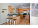 Charming kitchen with stainless steel appliances, hardwood floors, and breakfast bar at 3332 Chastain Landings Ct, Marietta, GA 30066