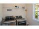 Laundry room with LG washer and dryer under a wire shelf at 3332 Chastain Landings Ct, Marietta, GA 30066