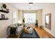 Comfortable living room with gray sofa, stylish decor, and ample natural light at 3332 Chastain Landings Ct, Marietta, GA 30066