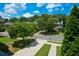 View of the street with mature trees, manicured lawns and sidewalks at 3332 Chastain Landings Ct, Marietta, GA 30066