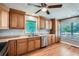 Well-equipped kitchen featuring wooden cabinetry, stainless steel appliances, and hardwood floors at 5093 Ravenwood Dr, Marietta, GA 30066