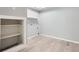 This laundry room features bright neutral paint, tile-look floors and built-in shelving at 5093 Ravenwood Dr, Marietta, GA 30066