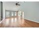 Large living room featuring vaulted ceilings, hardwood floors, and ample natural light at 5093 Ravenwood Dr, Marietta, GA 30066