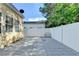 Private backyard featuring fenced in yard and large patio at 609 Bedford Court, Woodstock, GA 30188