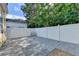 Private backyard featuring fenced in yard and large patio at 609 Bedford Court, Woodstock, GA 30188