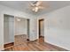 Bedroom with hardwood floors and closet with mirrored doors at 609 Bedford Court, Woodstock, GA 30188