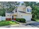 Charming two-story home with a two-car garage and well-maintained front lawn at 609 Bedford Court, Woodstock, GA 30188