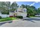 Charming two-story home with a two-car garage and well-maintained front lawn at 609 Bedford Court, Woodstock, GA 30188