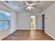 Spacious main bedroom featuring hardwood floors and an ensuite bathroom at 609 Bedford Court, Woodstock, GA 30188