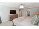 Comfortable bedroom with tray ceilings, lots of light, and ensuite bath at 2860 Windsor Knoll Dr, Dacula, GA 30019