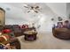 Spacious bonus room with comfortable seating, a large TV, and decor for watching a game at 2860 Windsor Knoll Dr, Dacula, GA 30019