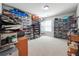 Spacious closet with containers and shelves for displaying and organizing an extensive shoe collection at 2860 Windsor Knoll Dr, Dacula, GA 30019