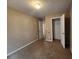 Neutral bedroom with a walk-in closet and a neutral color palette at 378 Durmire Dr, Jonesboro, GA 30236