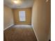 Bedroom featuring a window providing natural light and neutral walls at 378 Durmire Dr, Jonesboro, GA 30236
