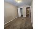 Neutral bedroom with a walk-in closet and a neutral color palette at 378 Durmire Dr, Jonesboro, GA 30236