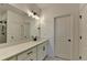This bathroom features a modern vanity with matte black hardware, quartz countertops, and a vessel sink for a sleek, stylish space at 4583 Roskin St, Duluth, GA 30097