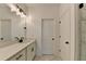This bathroom features a modern vanity with matte black hardware, quartz countertops, and a vessel sink for a sleek, stylish space at 4583 Roskin St, Duluth, GA 30097