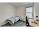 This bedroom features a cozy twin bed, a modern desk, and a bright window for a comfortable and productive space at 4583 Roskin St, Duluth, GA 30097