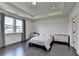 This main bedroom boasts large windows and recessed lighting that create a bright, relaxing atmosphere at 4583 Roskin St, Duluth, GA 30097