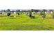 Scenic community area with a pond, bridge, and lush landscaping at 4583 Roskin St, Duluth, GA 30097