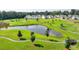 Overhead view of a pond surrounded by lush landscaping in a serene community setting at 4583 Roskin St, Duluth, GA 30097
