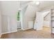 This carpeted bedroom features neutral walls, a window for natural light, and a closet at 658 Slew Ave, Lawrenceville, GA 30043
