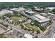 A scenic aerial view showcases an urban center featuring apartments, parks, offices, and commercial establishments at 1590 Sunnybrook Farm Rd, Atlanta, GA 30350