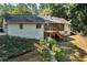 Back of house featuring a multi-story wooden porch at 1590 Sunnybrook Farm Rd, Atlanta, GA 30350