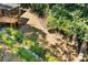An elevated perspective reveals a sloped backyard with deck at 1590 Sunnybrook Farm Rd, Atlanta, GA 30350