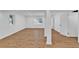 Finished basement space with windows and white trim at 1590 Sunnybrook Farm Rd, Atlanta, GA 30350