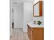 Bathroom featuring a vanity and tiled flooring and a walk-in shower at 1590 Sunnybrook Farm Rd, Atlanta, GA 30350