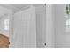 Bathroom with white shower curtain at 1590 Sunnybrook Farm Rd, Atlanta, GA 30350