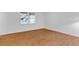 Bedroom with a window and wood-look floors at 1590 Sunnybrook Farm Rd, Atlanta, GA 30350