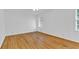 Bright bedroom with hardwood floors and natural light from the window at 1590 Sunnybrook Farm Rd, Atlanta, GA 30350