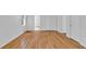 Bright bedroom features beautiful hardwood floors and large closets, perfect for storage and comfort at 1590 Sunnybrook Farm Rd, Atlanta, GA 30350