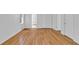 Bright bedroom with hardwood floors and ample closet space for easy storage at 1590 Sunnybrook Farm Rd, Atlanta, GA 30350